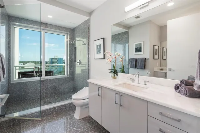 a view of a glass door shower