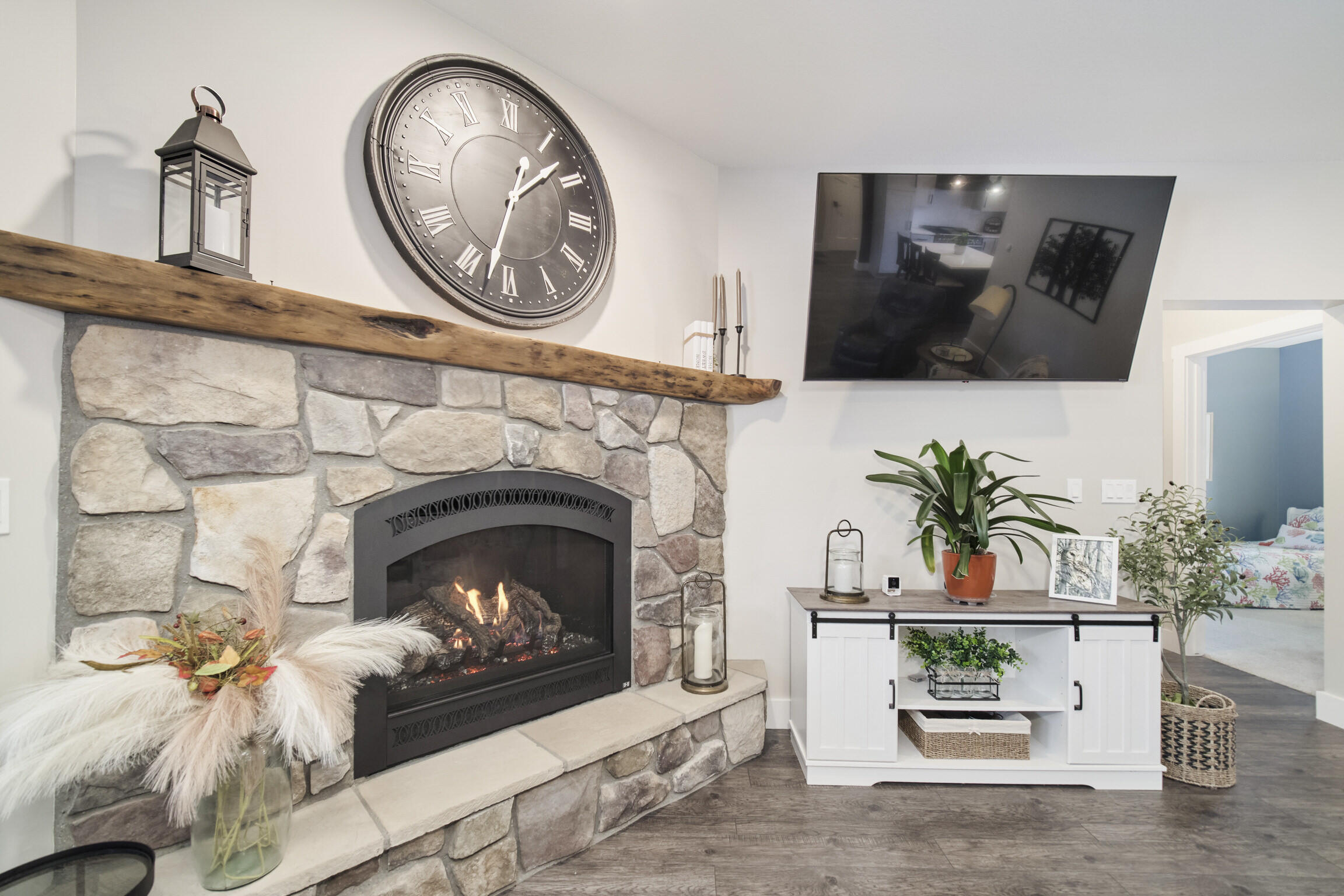 10201 Opal Ridge Drive Onekama, MI 49675 - Photo 13 of 88 Real stone fireplace surroun