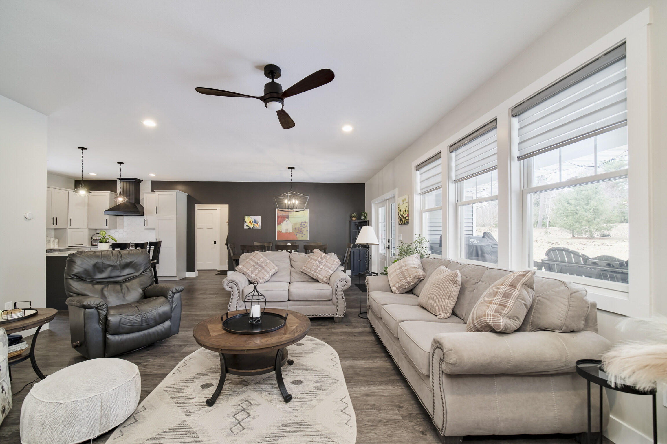 10201 Opal Ridge Drive Onekama, MI 49675 - Photo 16 of 88 Living room opens to dining & kitchen
