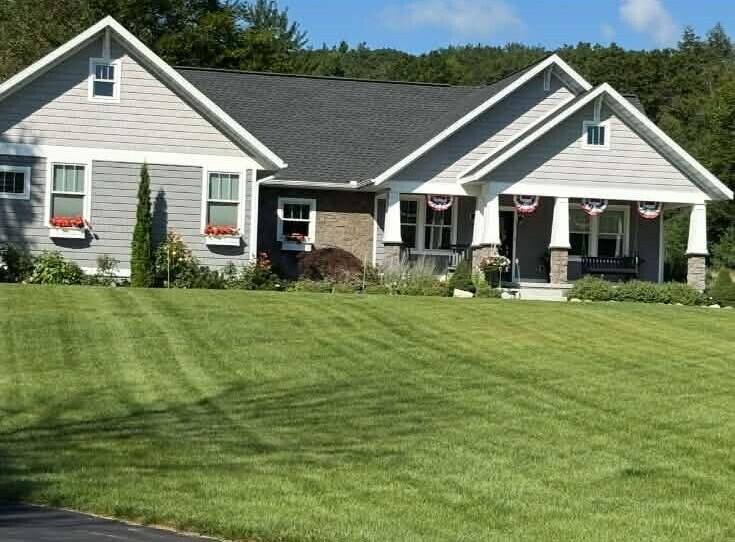 10201 Opal Ridge Drive Onekama, MI 49675 - Photo 2 of 88 Flower boxes and underground sprinkling