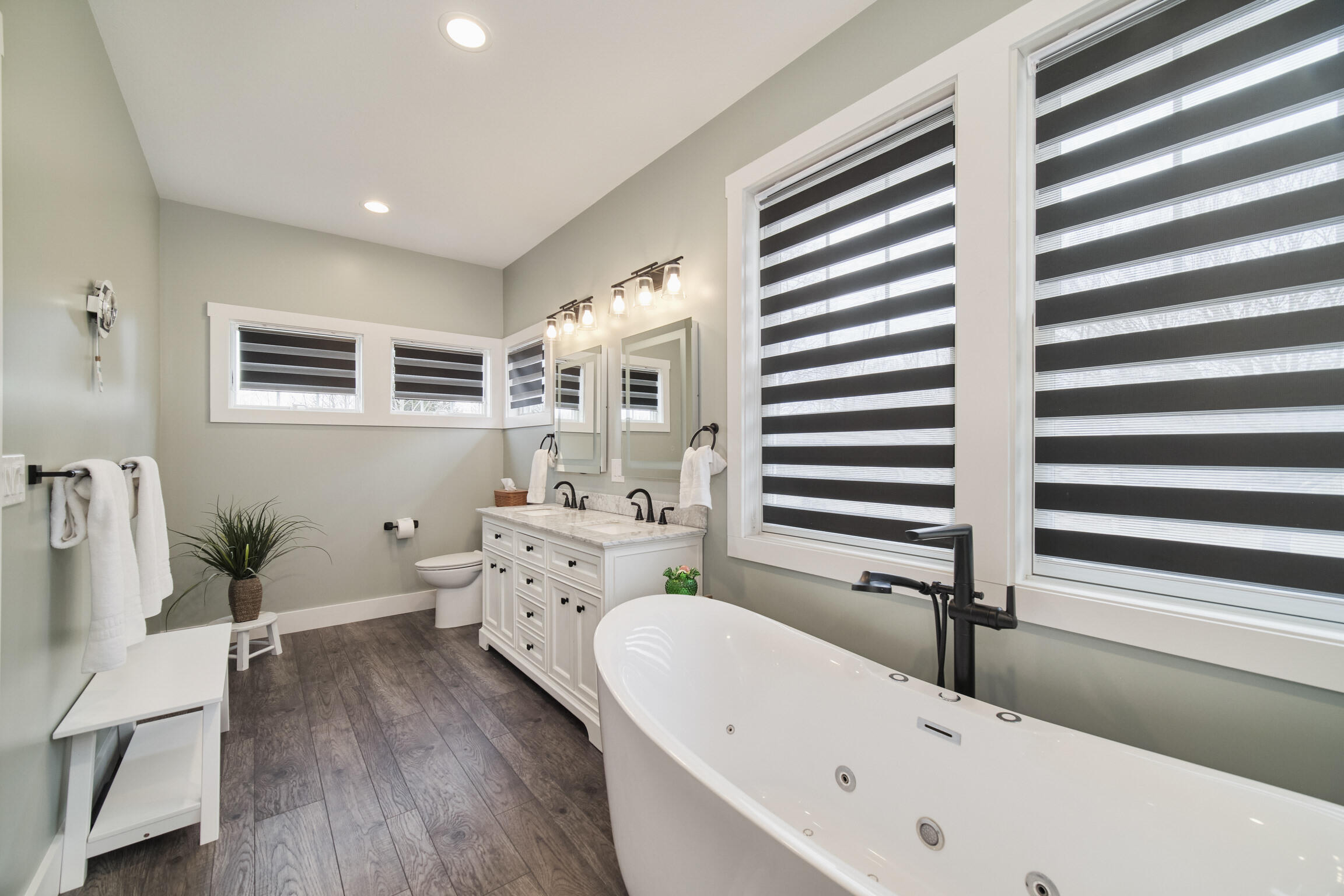 10201 Opal Ridge Drive Onekama, MI 49675 - Photo 32 of 88 Zebra blinds on all windows