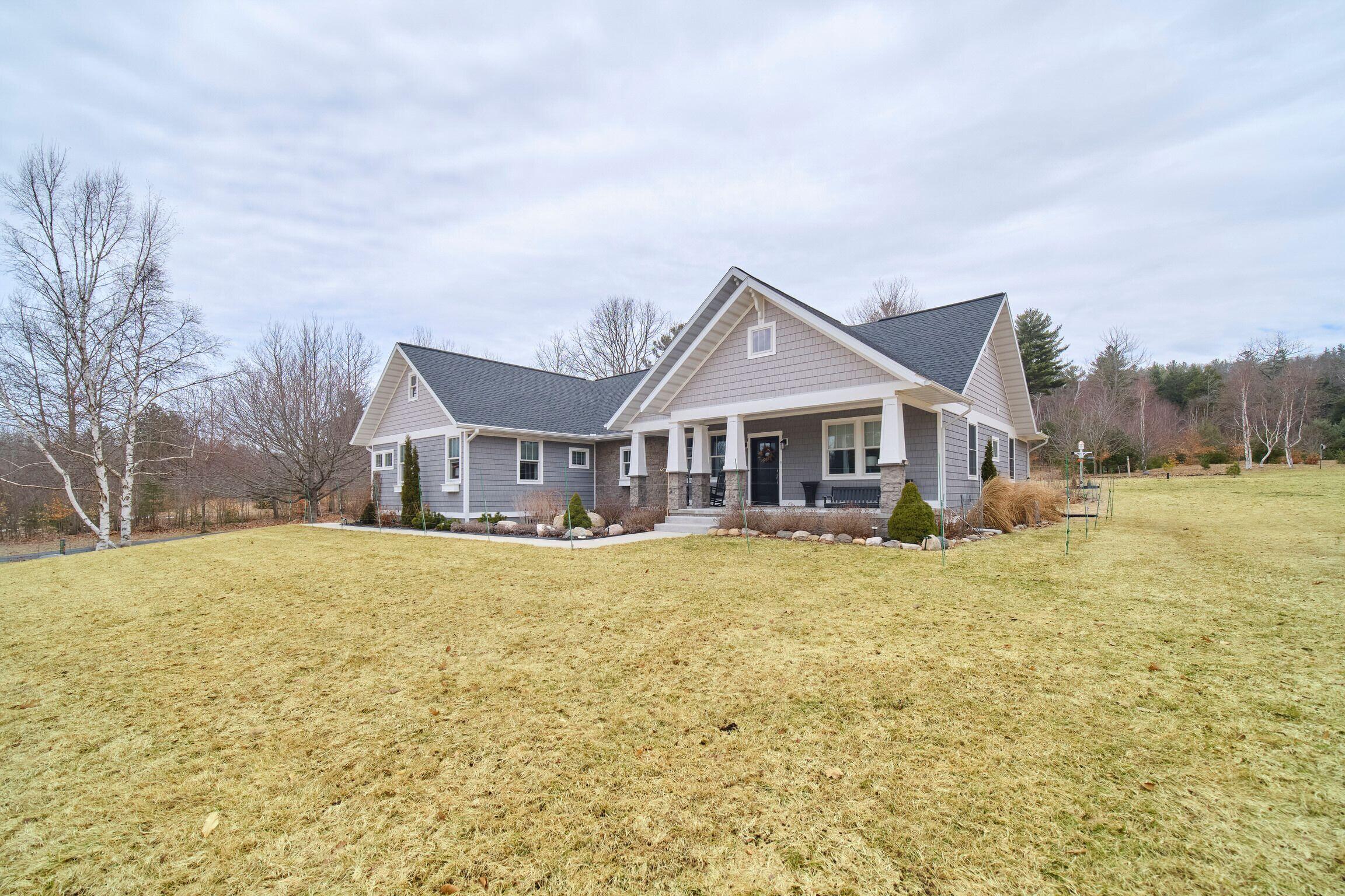 10201 Opal Ridge Drive Onekama, MI 49675 - Photo 4 of 88 Beautiful roof angles