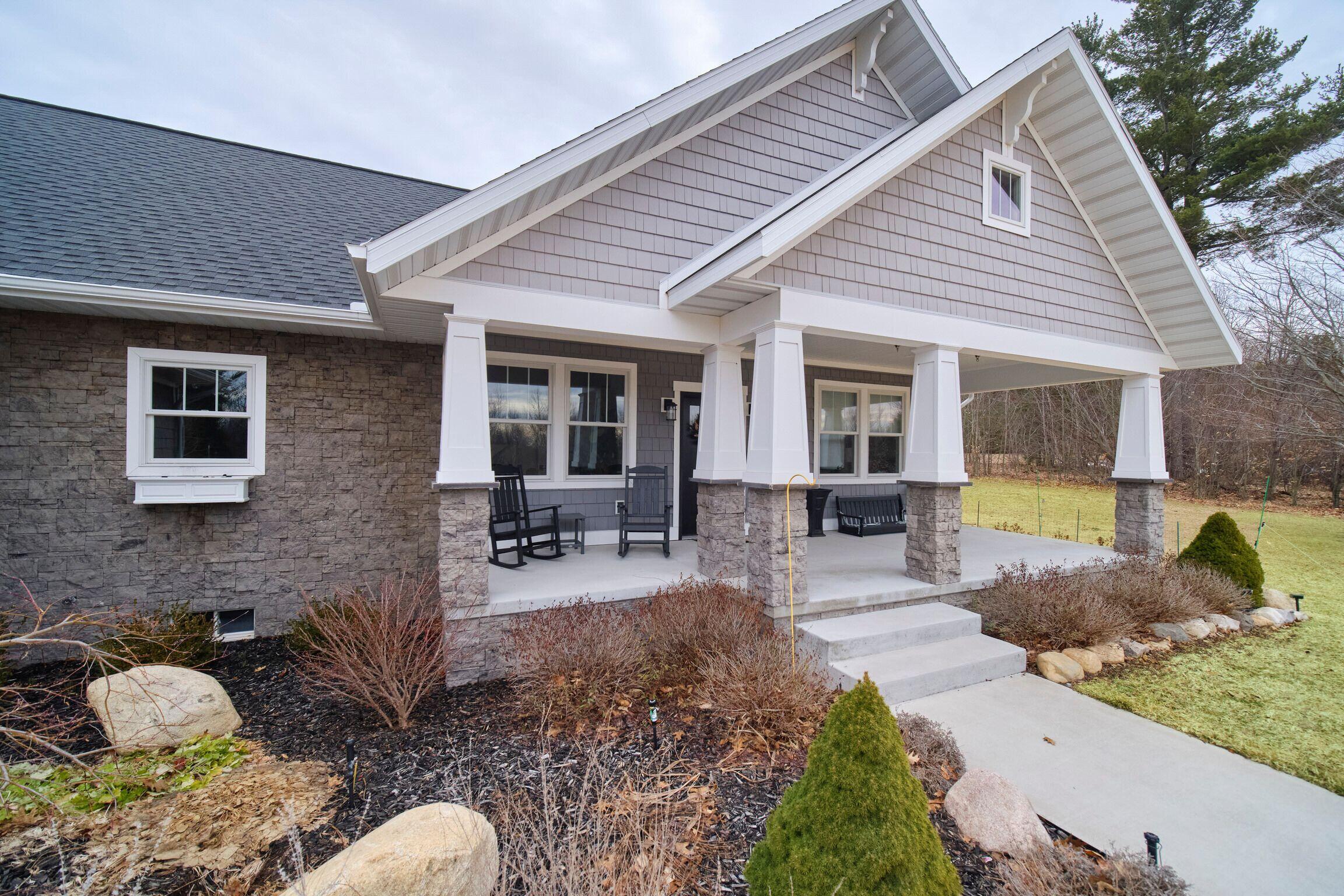 10201 Opal Ridge Drive Onekama, MI 49675 - Photo 5 of 88 Dream front porch!