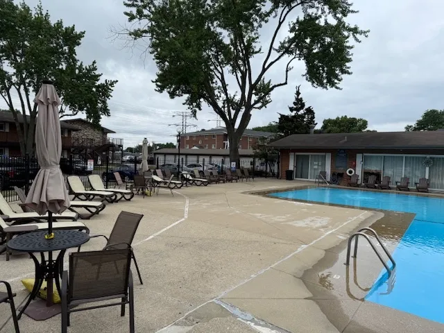 a view of an outdoor space and swimming pool