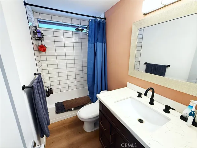 a bathroom with a sink and toilet