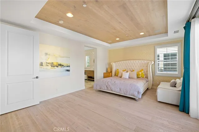 a spacious bathroom with a double vanity sink and a mirror