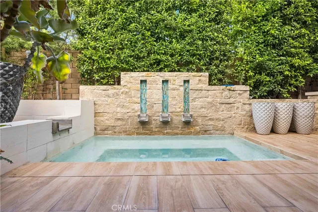 a view of a wooden fence and trees
