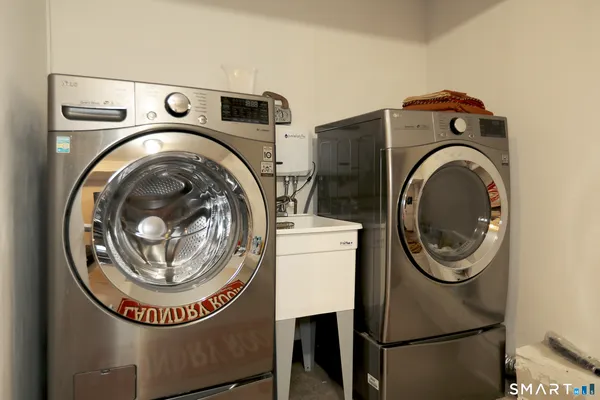 a utility room with dryer and washer