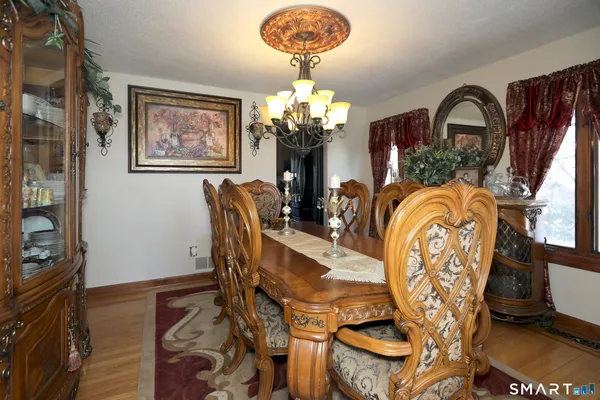 a view of a dining room with furniture