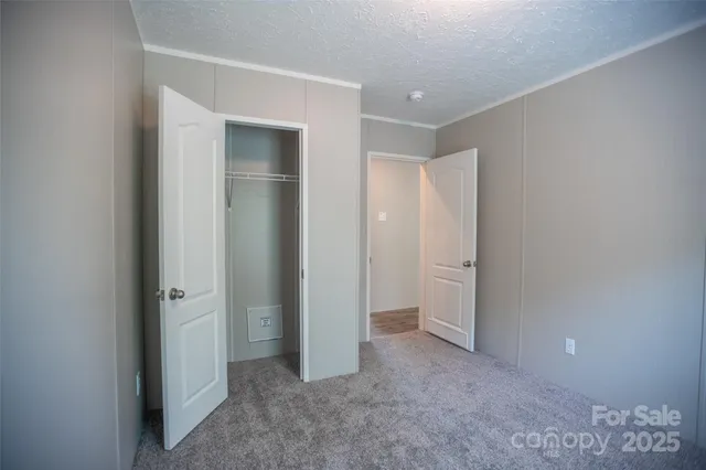 an empty room with closet