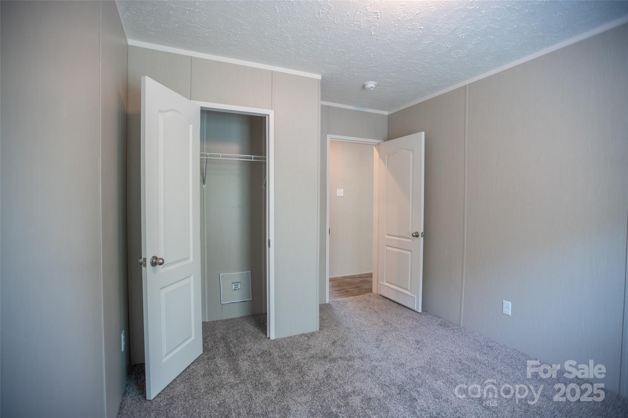 1451 Newfound Road Leicester, NC 28748 - Photo 25 of 39 an empty room with closet