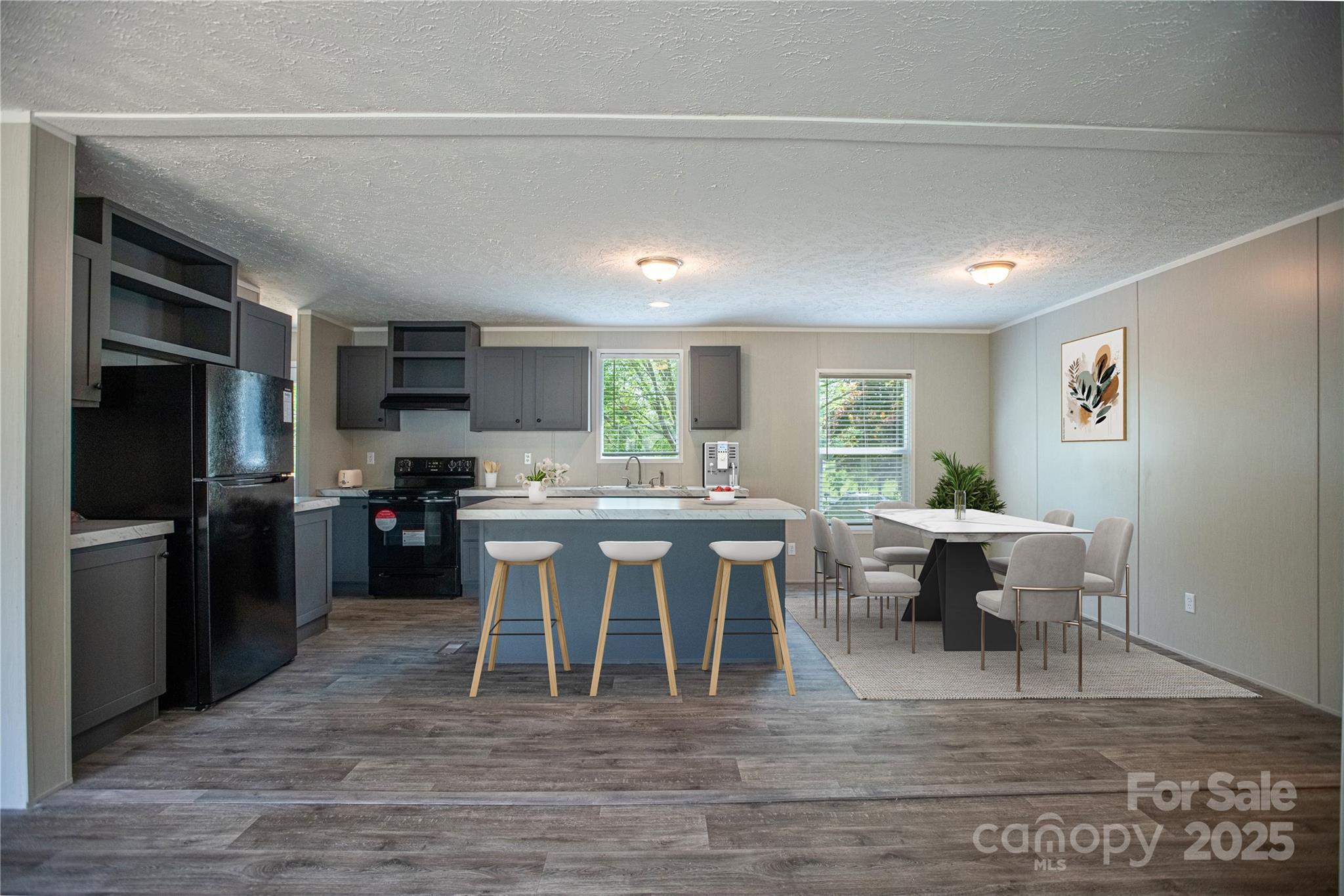 1451 Newfound Road Leicester, NC 28748 - Photo 3 of 39 a kitchen with a table and chairs in it