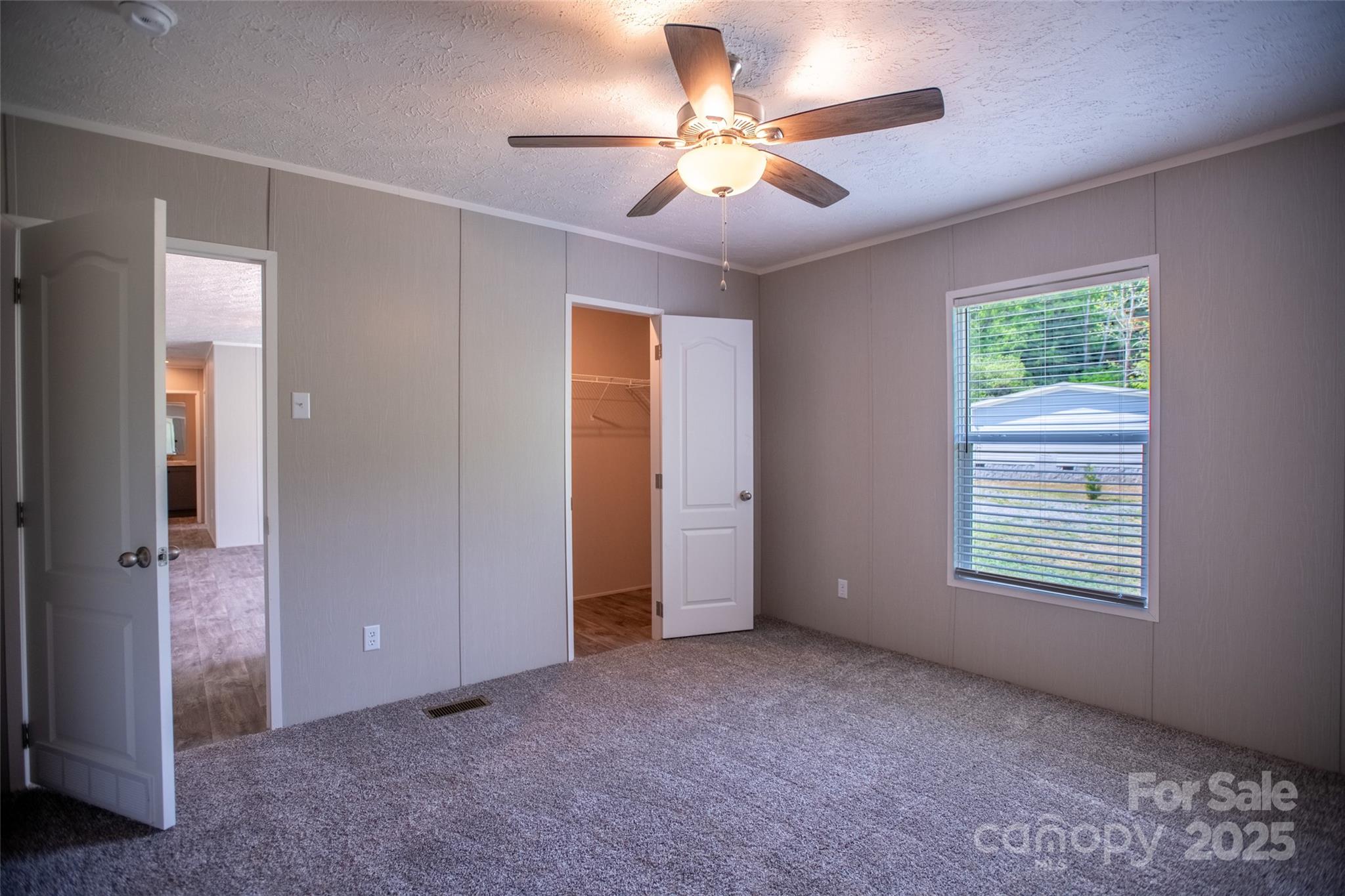1451 Newfound Road Leicester, NC 28748 - Photo 35 of 39 a view of an empty room with a window