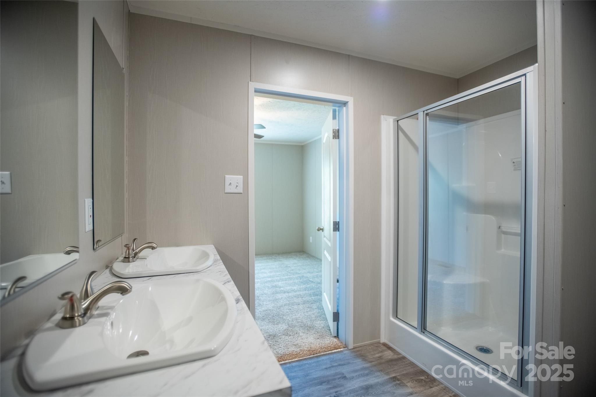 1451 Newfound Road Leicester, NC 28748 - Photo 37 of 39 a bathroom with a sink and a mirror