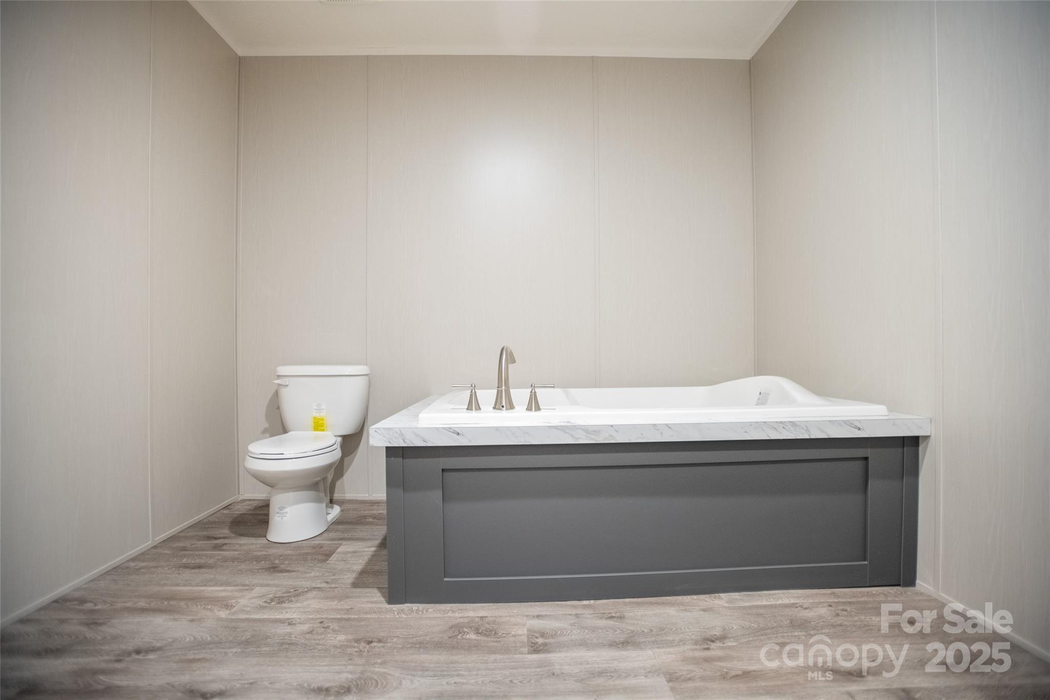 1451 Newfound Road Leicester, NC 28748 - Photo 38 of 39 a bathroom with a sink and a toilet