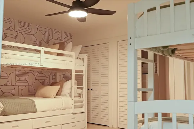 a bedroom with a bed and furniture