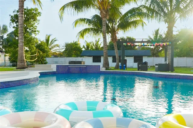 a view of multiple houses with a yard