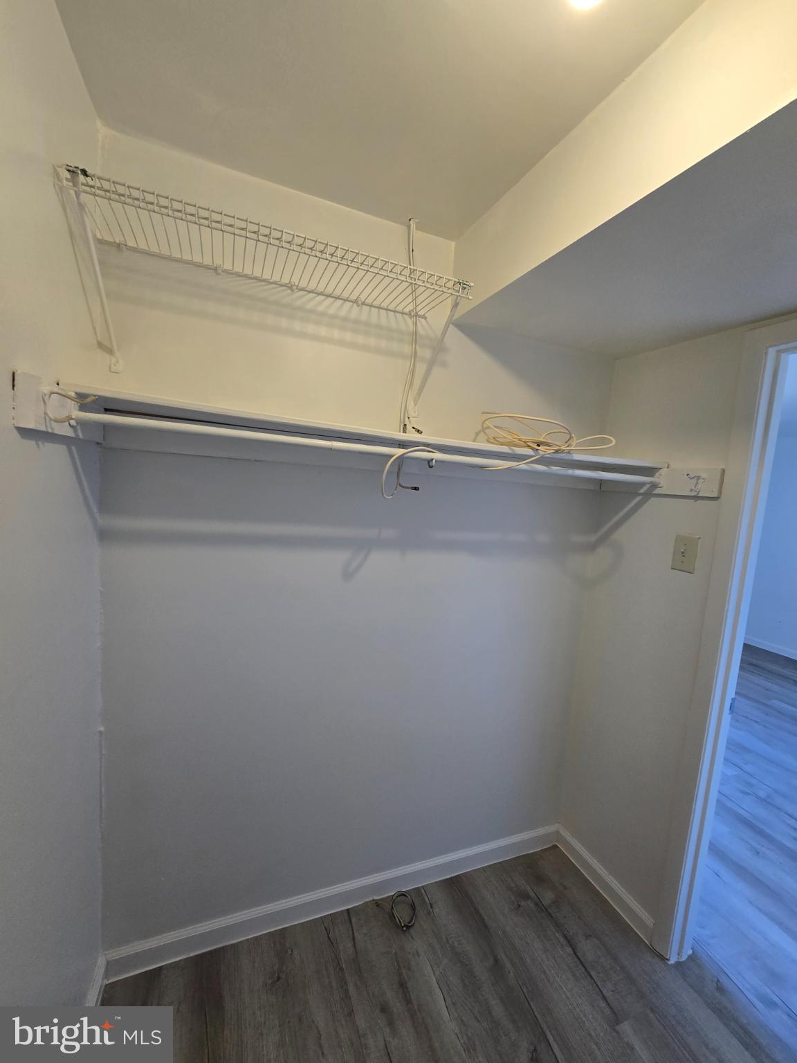 18901 Smoothstone Way, Unit I3 Gaithersburg, MD 20886 - Photo 27 of 36 a view of a room with racks on the wall