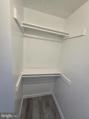 a view of small space with racks on the wall