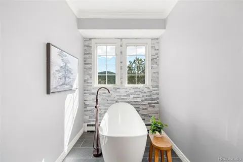 a picture of a bathroom with a sink and a mirror