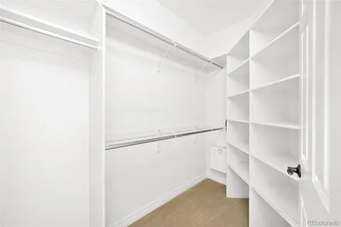 a view of an empty walk in closet