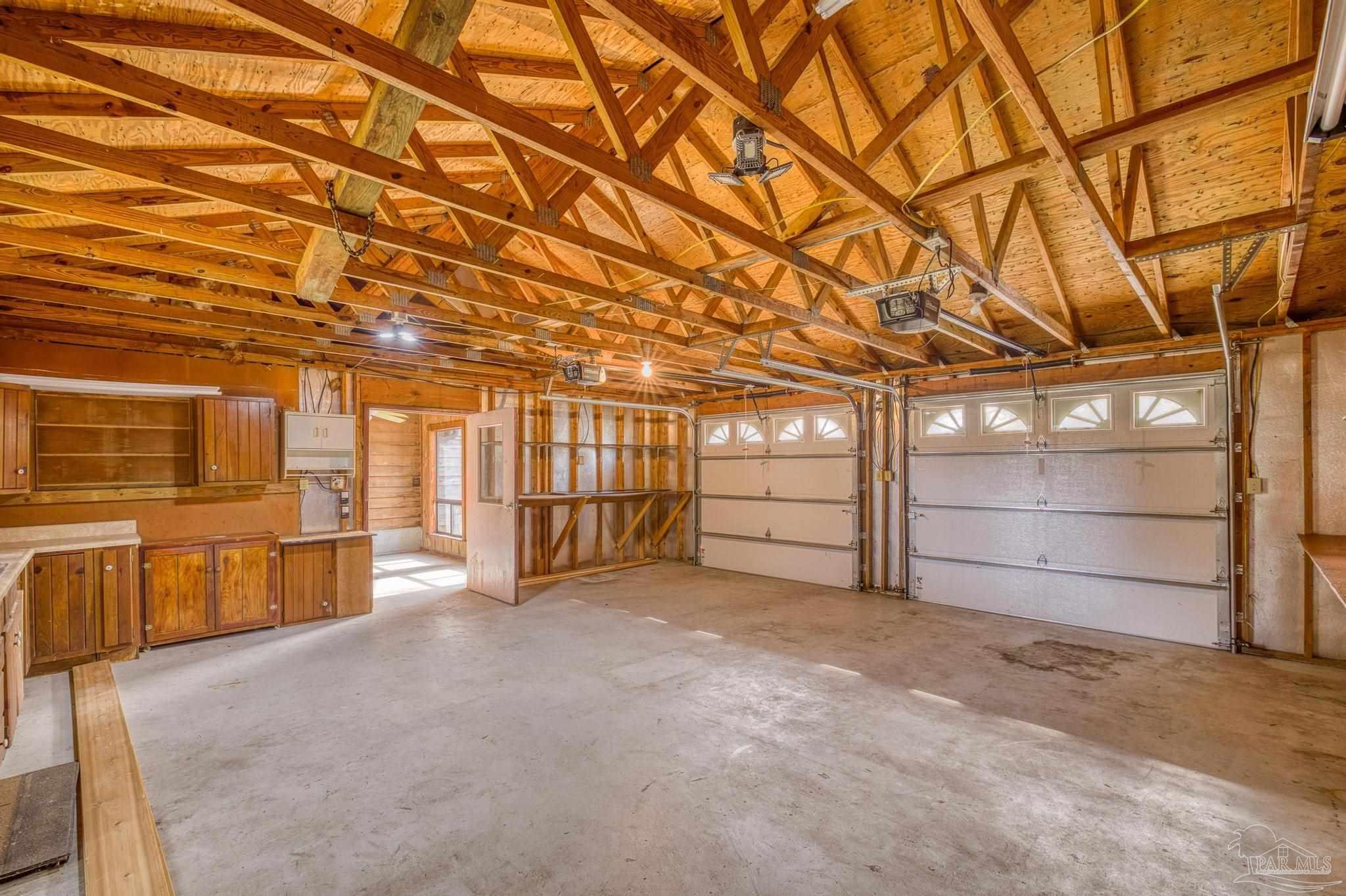 4960 Hyatt Lane Pace, FL 32571 - Photo 17 of 23 a view of a room with garage