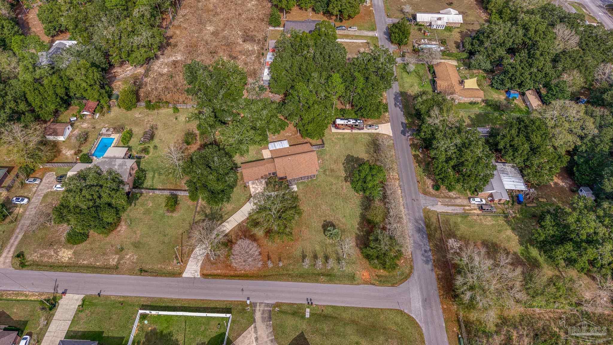 4960 Hyatt Lane Pace, FL 32571 - Photo 21 of 23 an aerial view of a residential houses with outdoor space