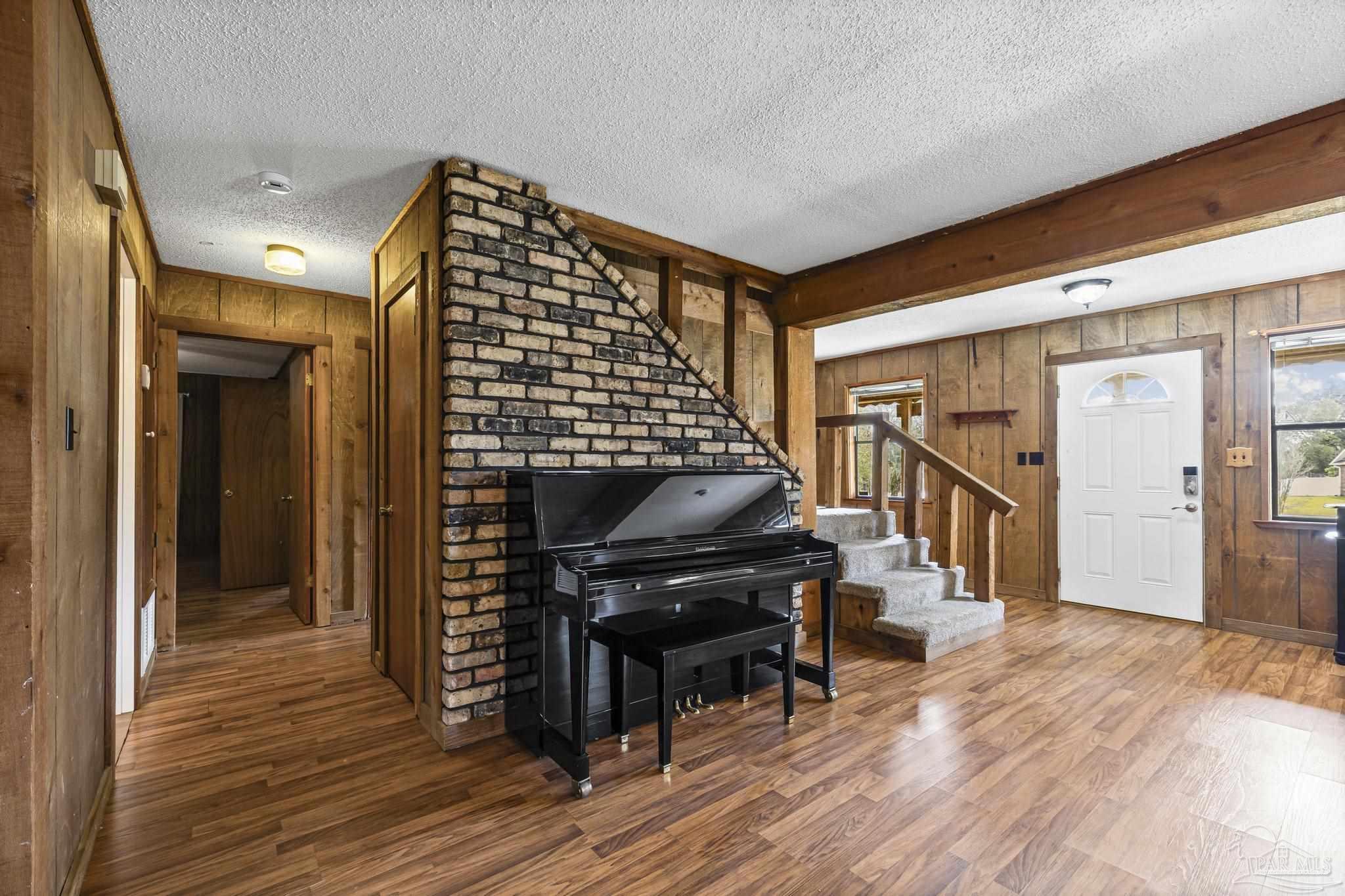 4960 Hyatt Lane Pace, FL 32571 - Photo 5 of 23 a view of entryway with wooden floor