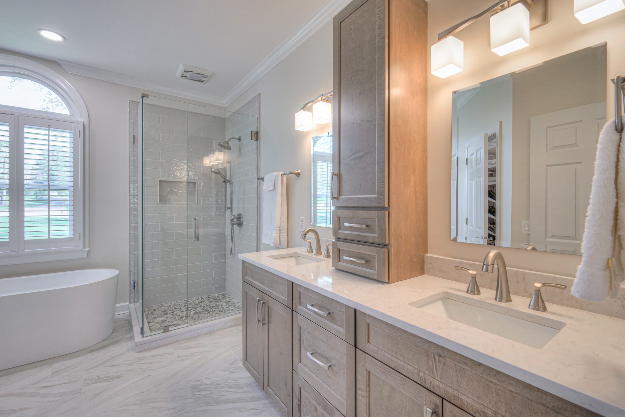 305 Eiderdown Court Franklin, TN 37064 - Photo 11 of 31 a spacious bathroom with a bathtub shower sink double and mirror
