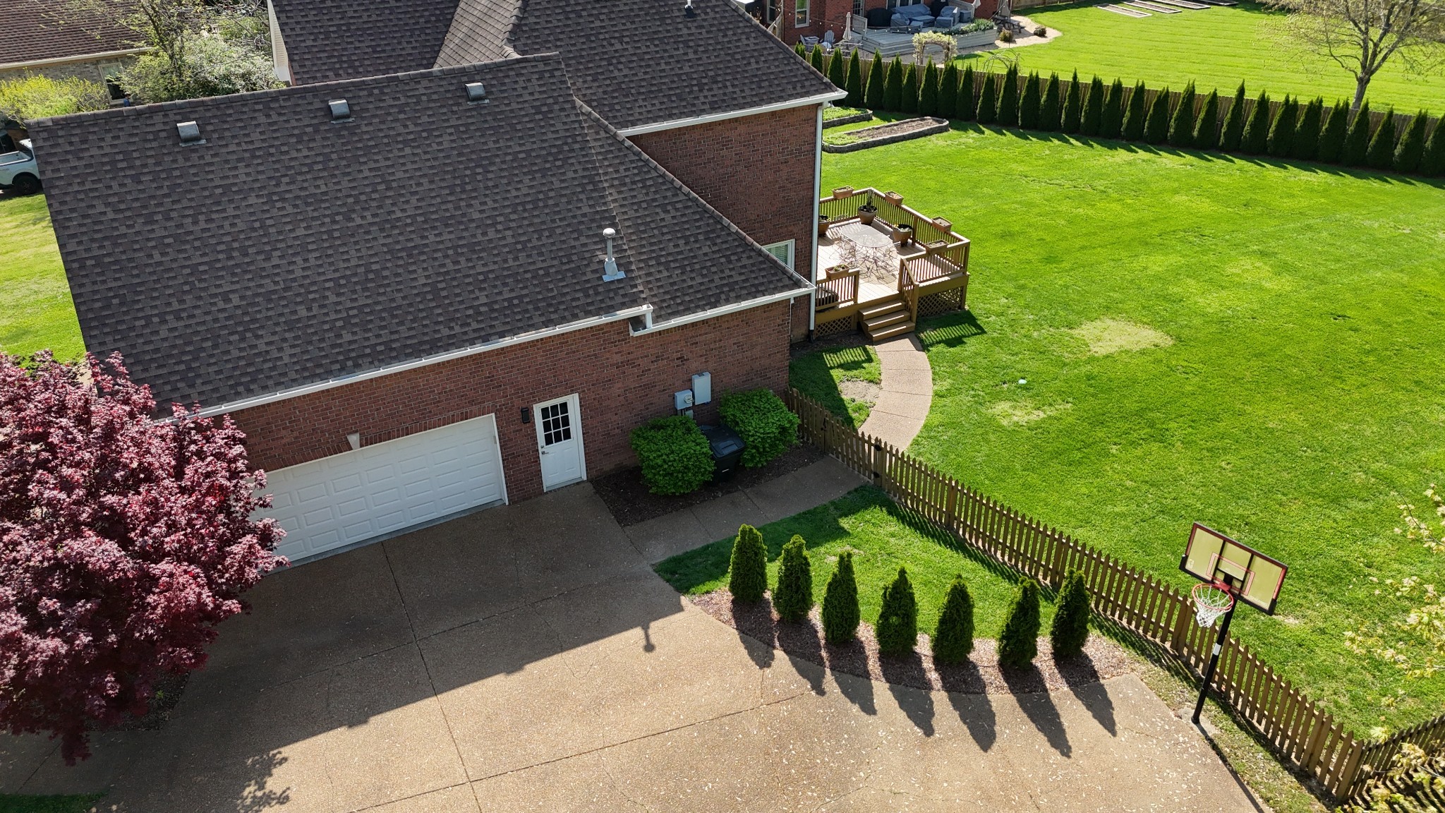 305 Eiderdown Court Franklin, TN 37064 - Photo 29 of 31 a backyard of a house with lots of green space