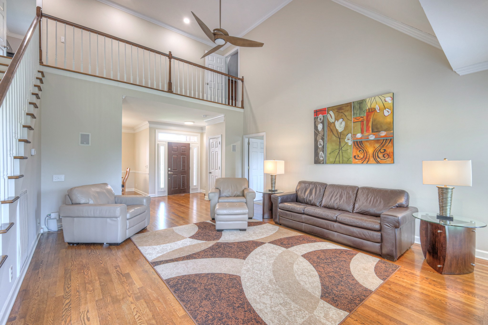 305 Eiderdown Court Franklin, TN 37064 - Photo 3 of 31 a living room with furniture and a couch