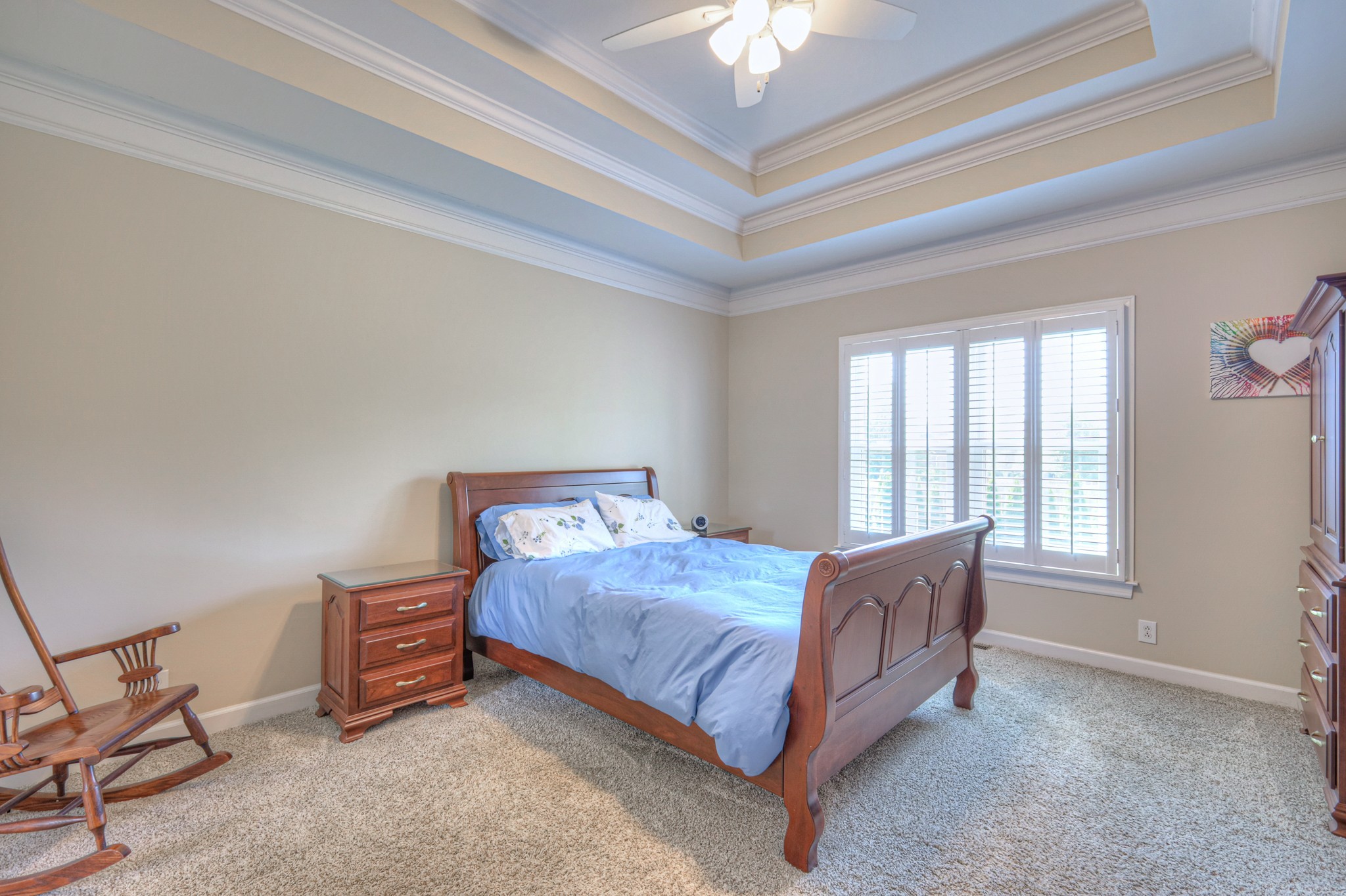 305 Eiderdown Court Franklin, TN 37064 - Photo 10 of 31 a bedroom with a bed lamp and a large window