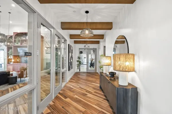 a view of a hallway with windows