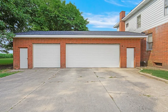 a view of outdoor space and front view of a house