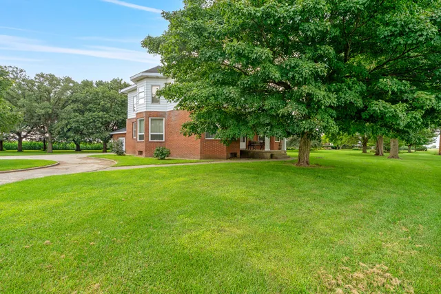 a view of a house with a big yard