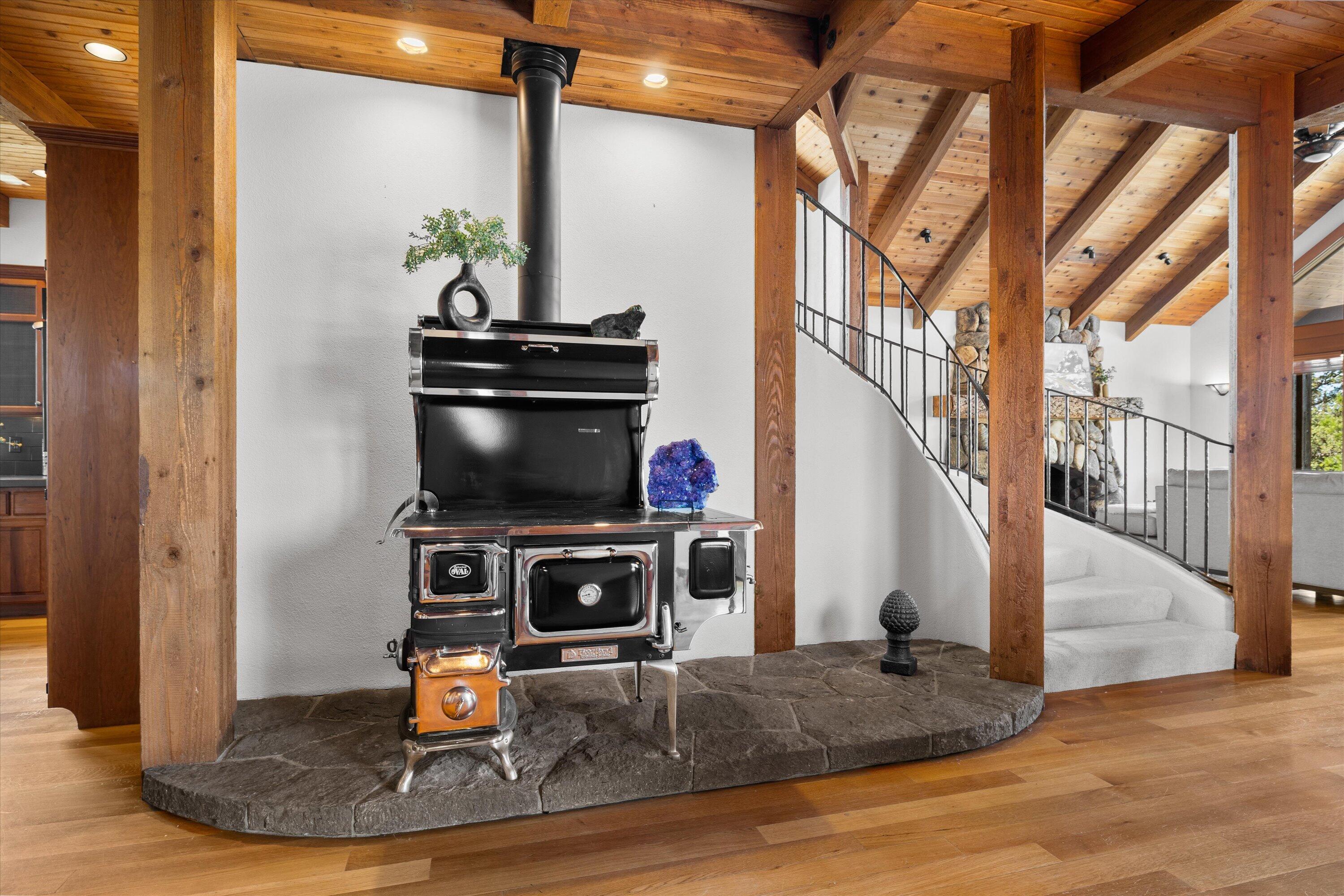 64155 Hunnell Road Bend, OR 97703 - Photo 21 of 96 Collector's wood burning cookstove adds charm and function.