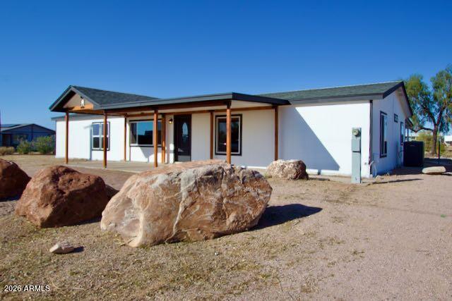 1470 South Bowman Road Apache Junction, AZ 85119 - Photo 14 of 56 a view of a house with large outdoor space and balcony