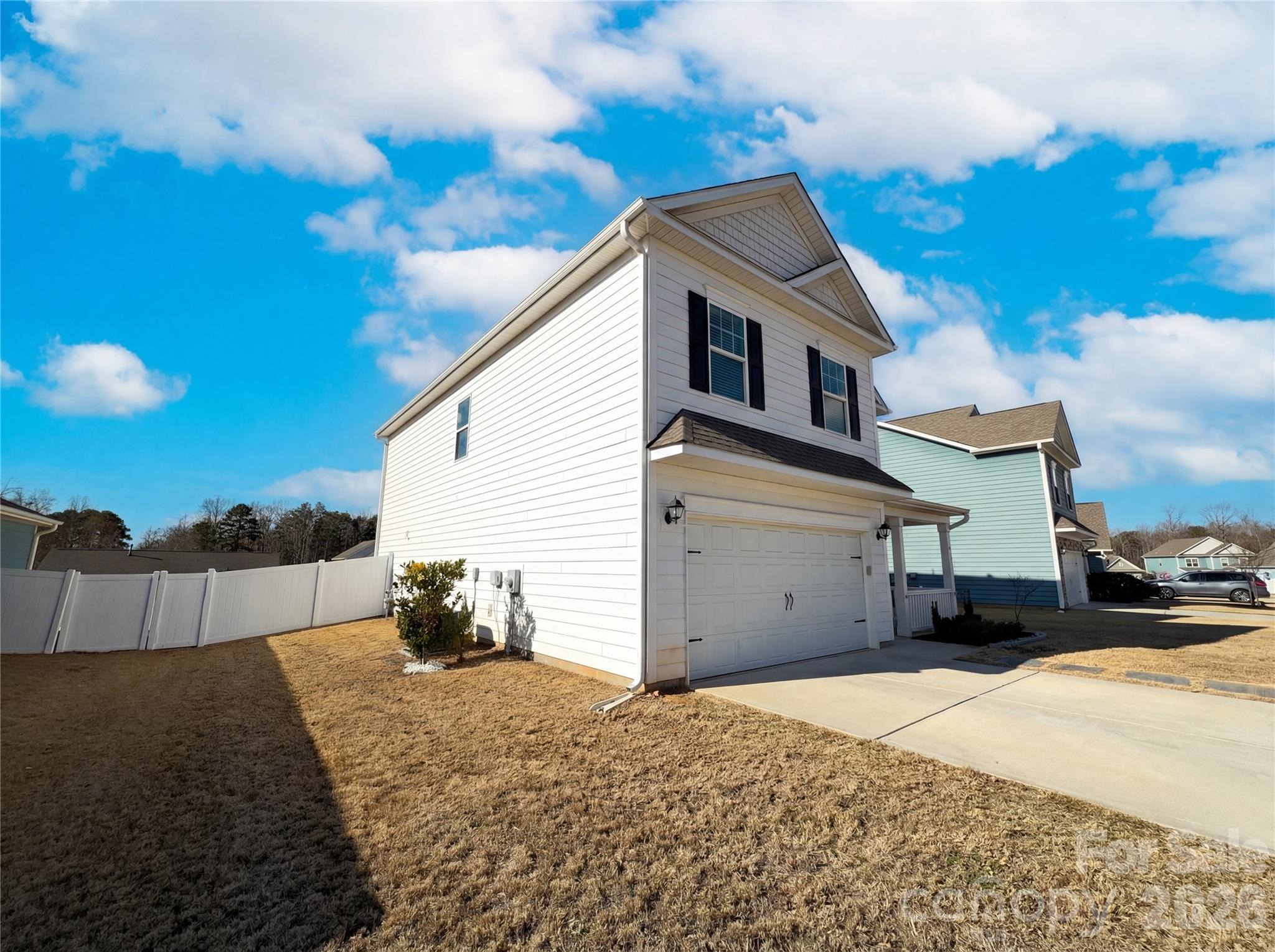 617 Ardsley Drive Locust, NC 28097 - Photo 22 of 23 a front view of a house with a yard