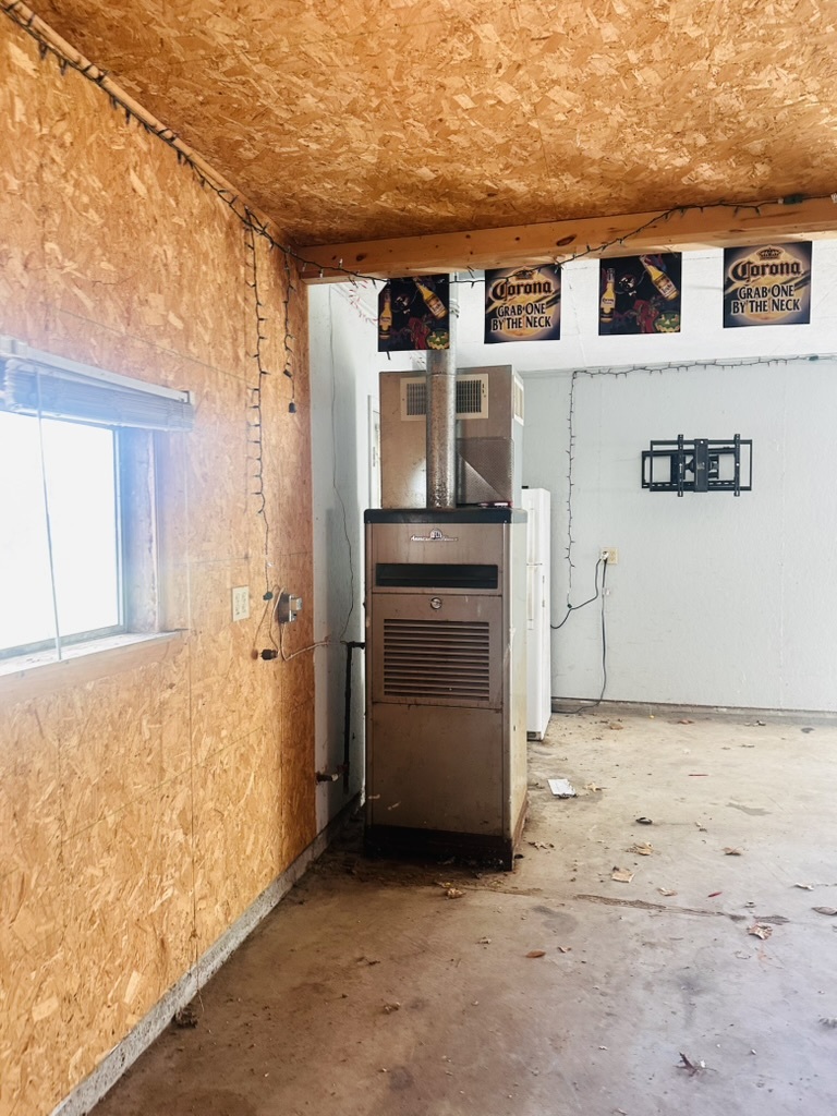 411 East Hamilton Street Odell, IL 60460 - Photo 5 of 19 a view of a refrigerator and an empty room