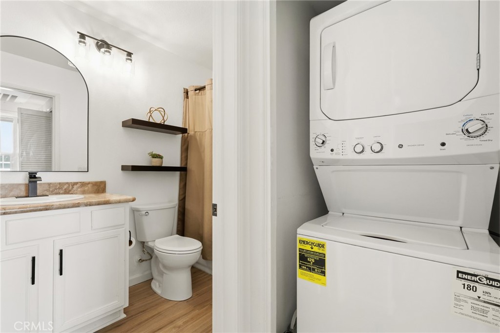 52 Valmont Way Ladera Ranch, CA 92694 - Photo 17 of 29 a bathroom with a toilet and a mirror