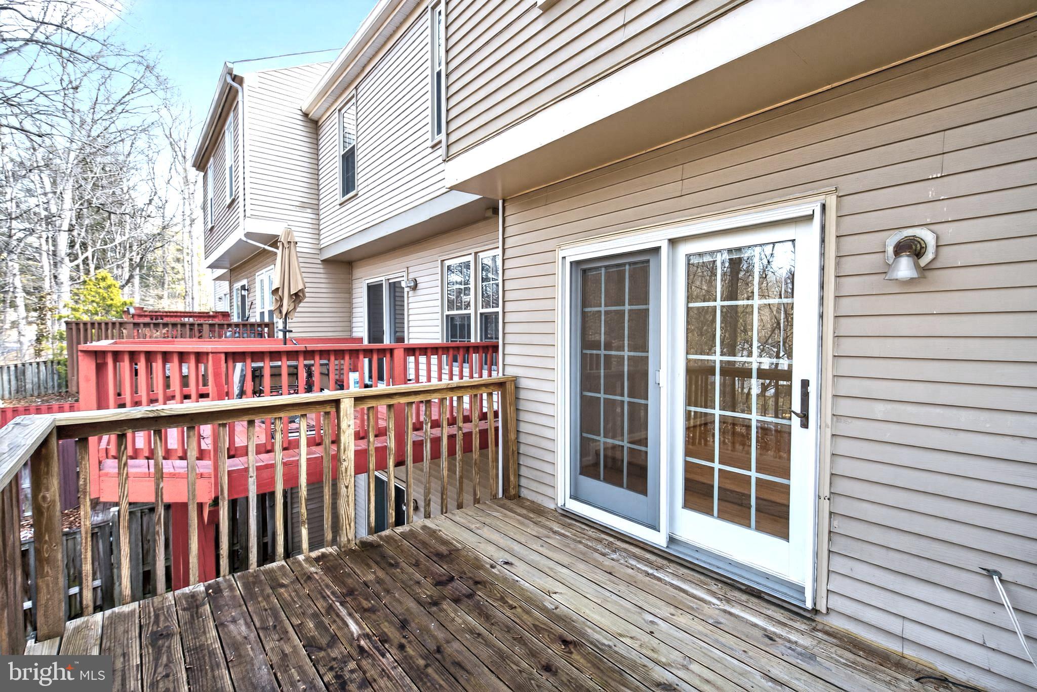 8868 Winding Hollow Way Springfield, VA 22152 - Photo 20 of 53 a view of wooden deck