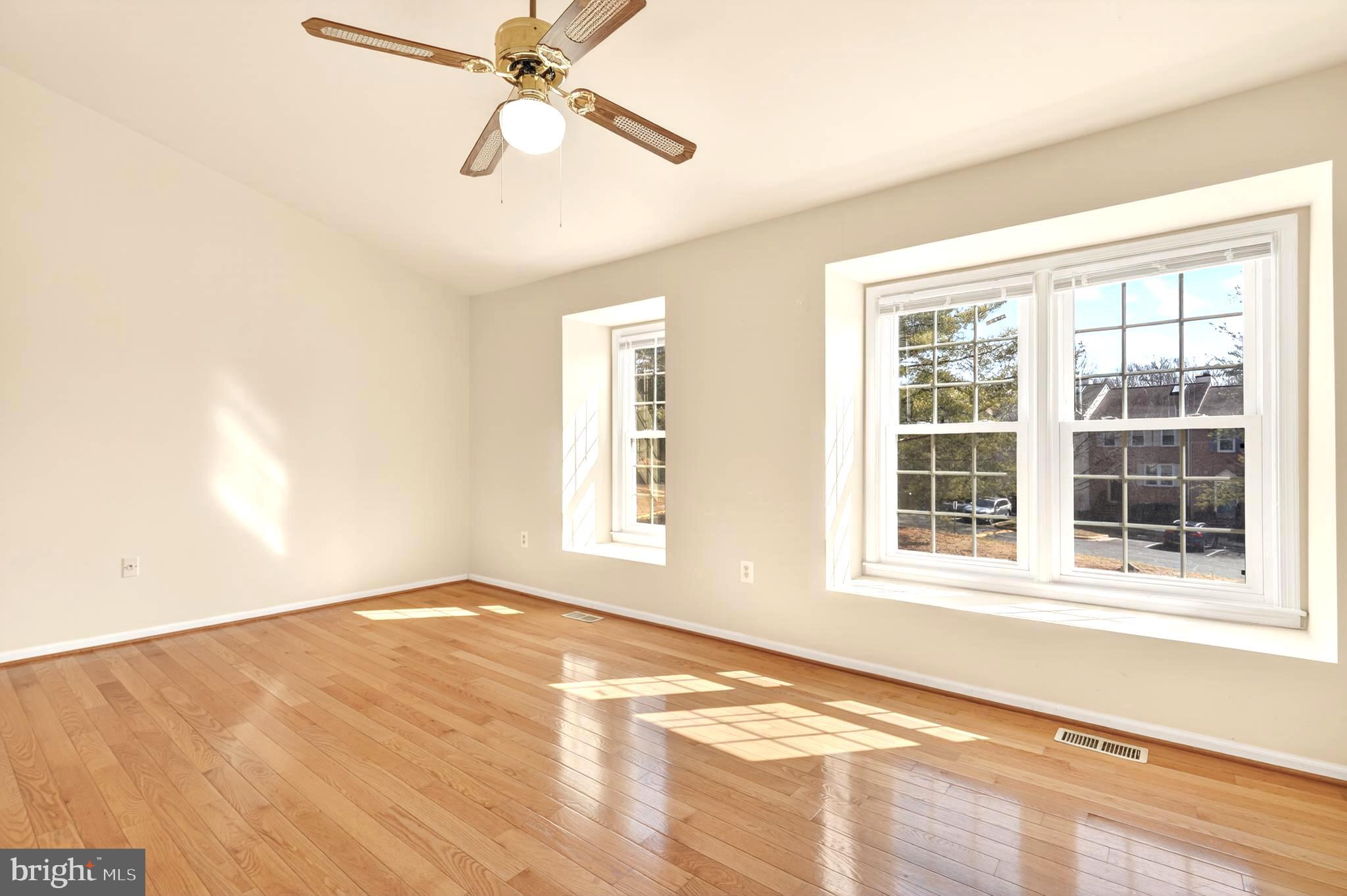 8868 Winding Hollow Way Springfield, VA 22152 - Photo 24 of 53 a view of an empty room with a window