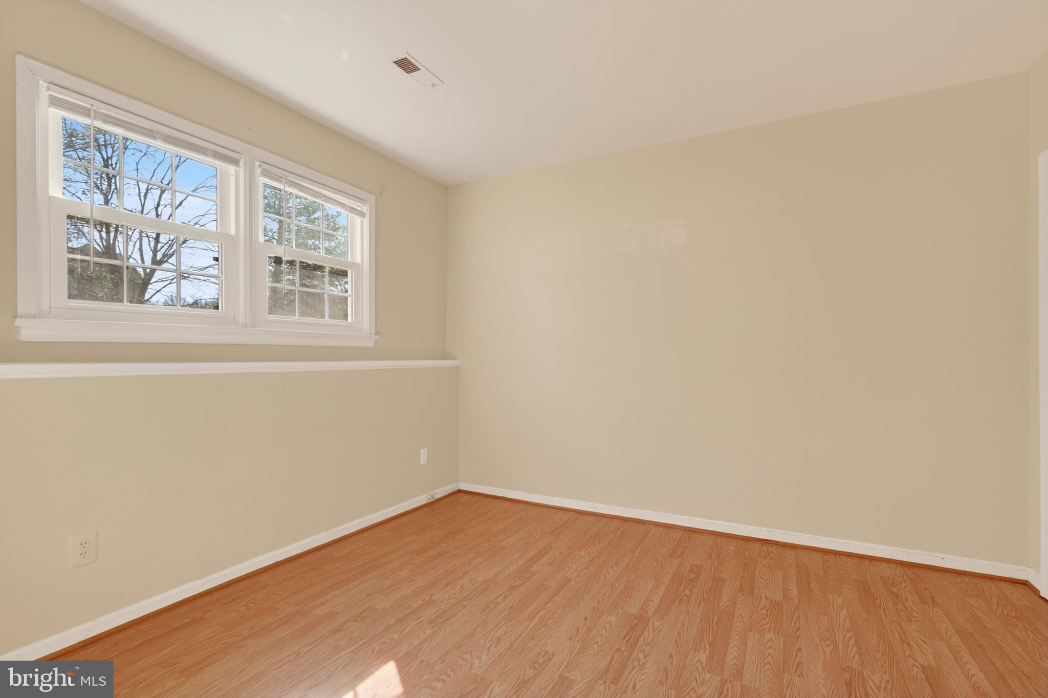 8868 Winding Hollow Way Springfield, VA 22152 - Photo 36 of 53 an empty room with a window