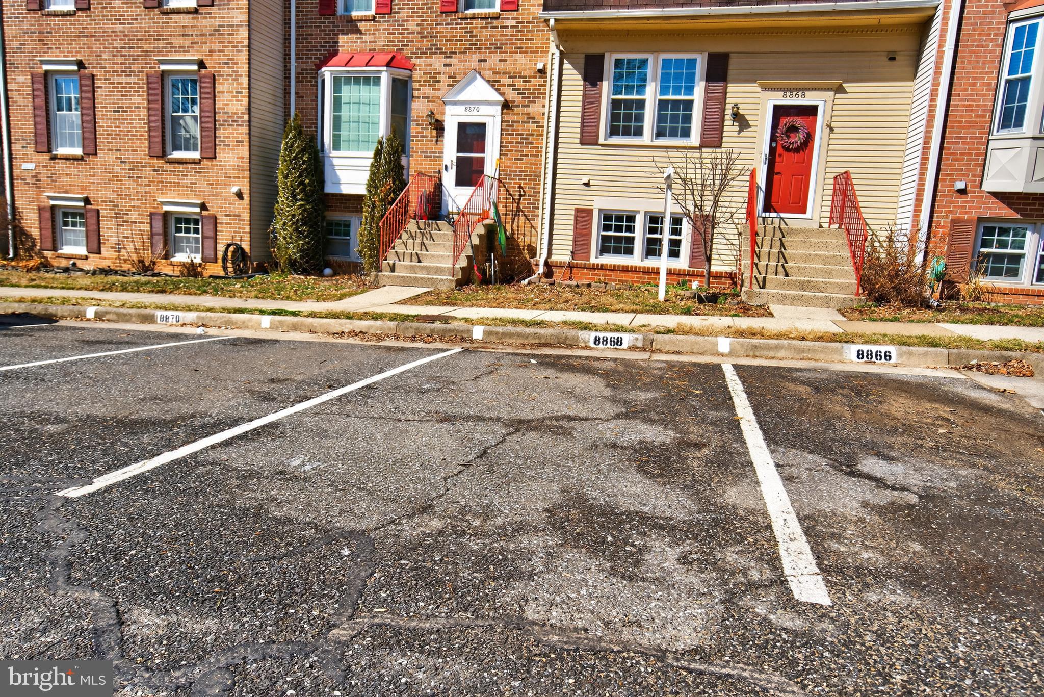 8868 Winding Hollow Way Springfield, VA 22152 - Photo 51 of 53 front view of a building with a street