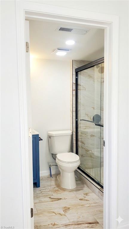 2814 Triangle Lake Road High Point, NC 27260 - Photo 8 of 13 Master Bathroom: Used AI to enhance brightness