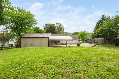 a house view with a garden space