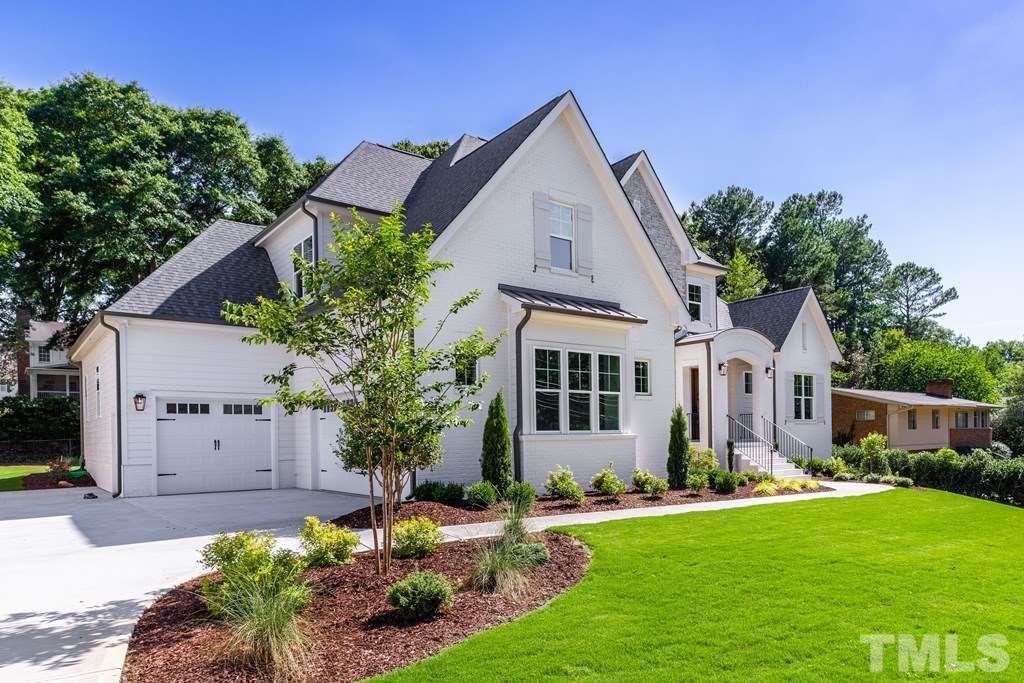 3319 Lake Boone Trail Raleigh, NC 27607 - Photo 2 of 30 a front view of a house with a yard