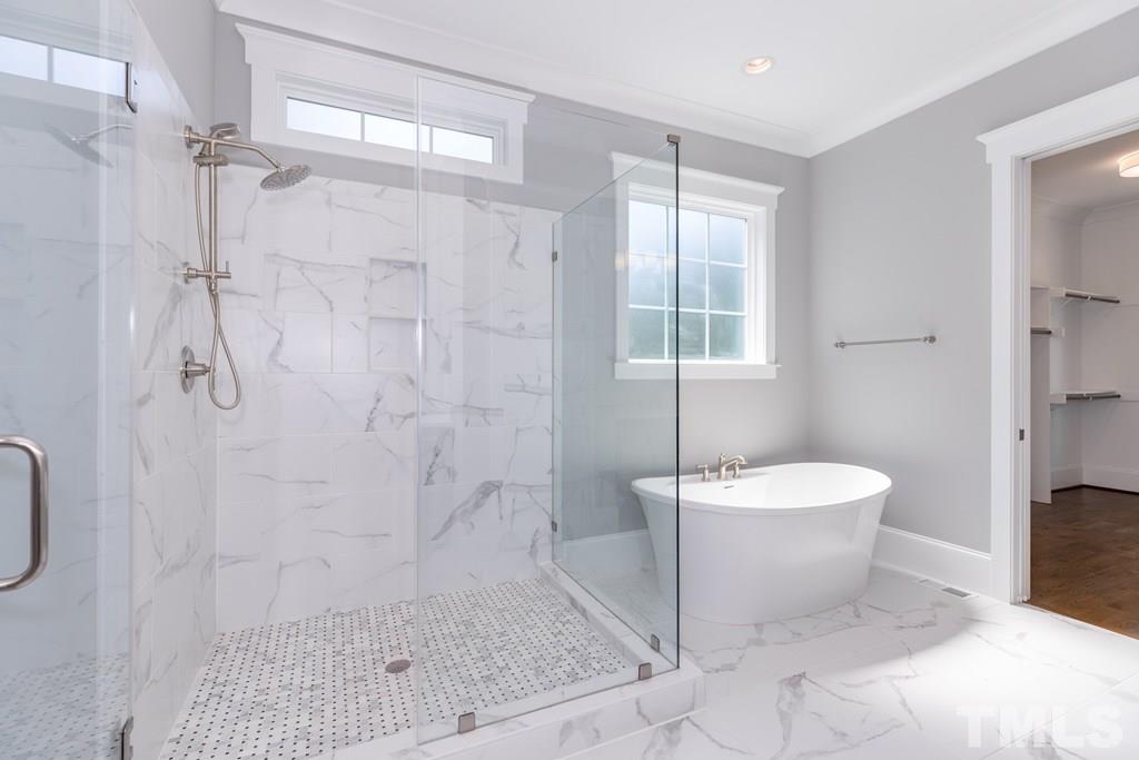 3319 Lake Boone Trail Raleigh, NC 27607 - Photo 13 of 30 a bath room with a toilet a bath tub and a shower