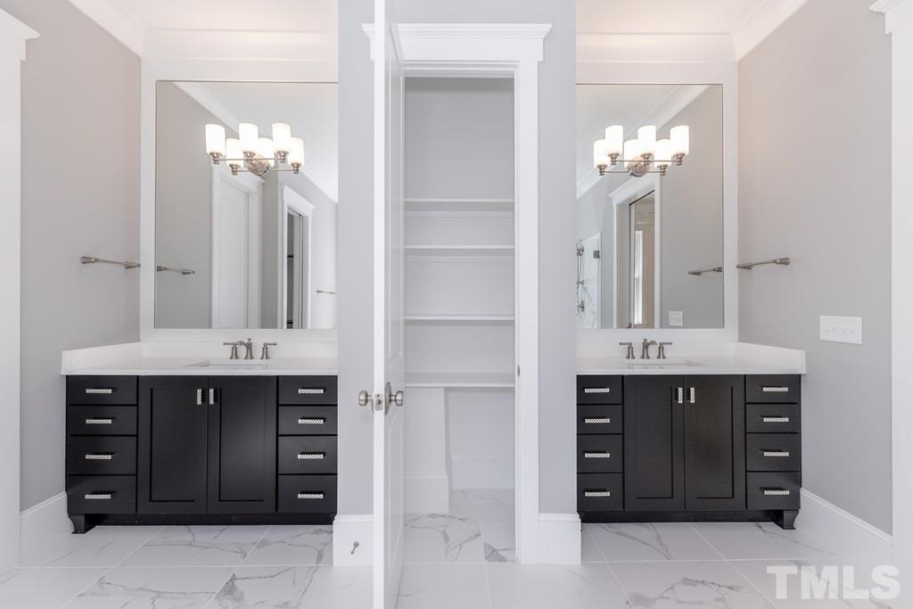 3319 Lake Boone Trail Raleigh, NC 27607 - Photo 15 of 30 a spacious bathroom with a granite countertop sink and a mirror