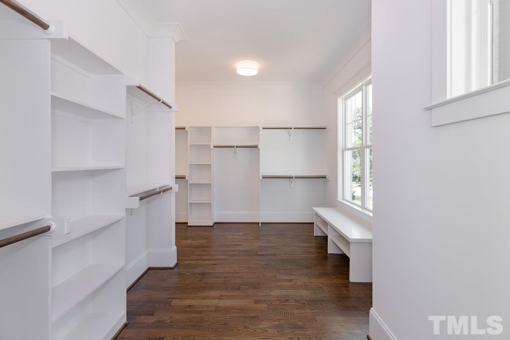 3319 Lake Boone Trail Raleigh, NC 27607 - Photo 16 of 30 a view of empty room with wooden floor and kitchen